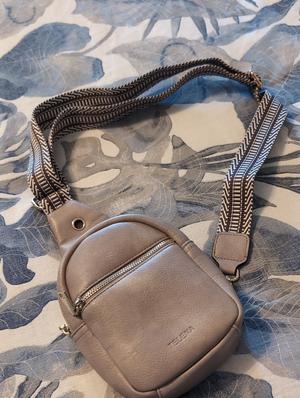 TELENA Sleek Taupe Mini Backpack Crossbody with Patterned Strap
